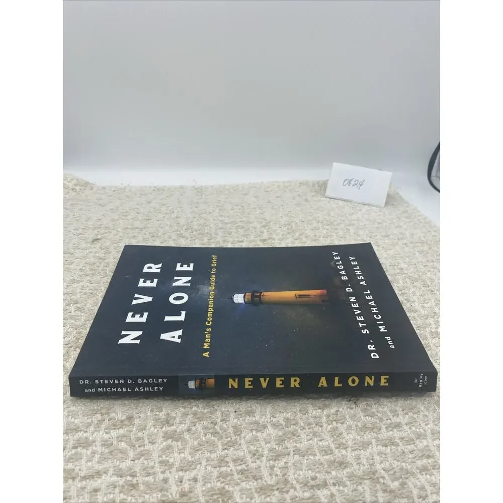 Never Alone-A Mans Companion To Grief by Dr Steven Bagley & Michael Ashley Signe